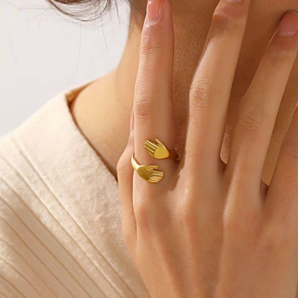 Gold Hug Ring – Adjustable Hand Embrace Fashion Ring for Women